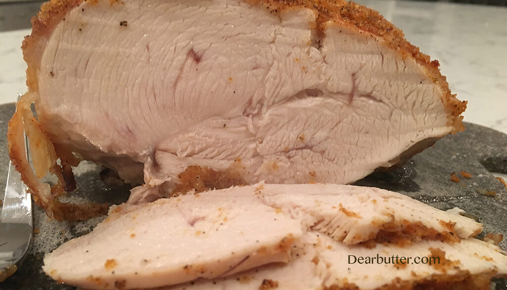 Sliced roast chicken breast.