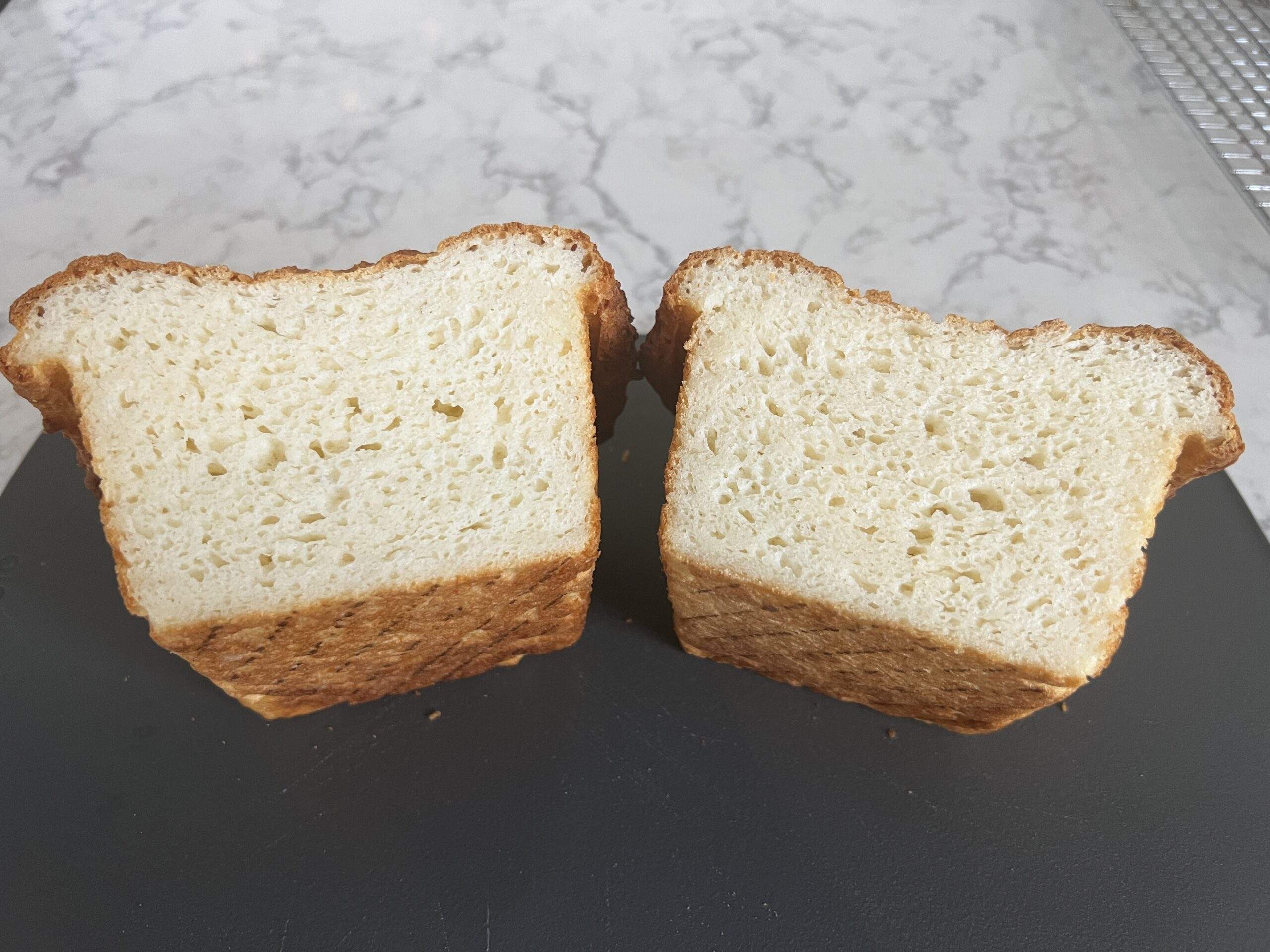 loaf of gluten-free bread cut in two